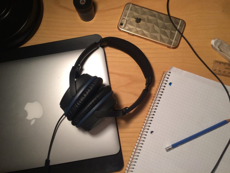 Closed laptop and headphones